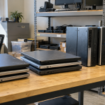 Retired office laptops and desktop computers awaiting assessment for reuse or recycling